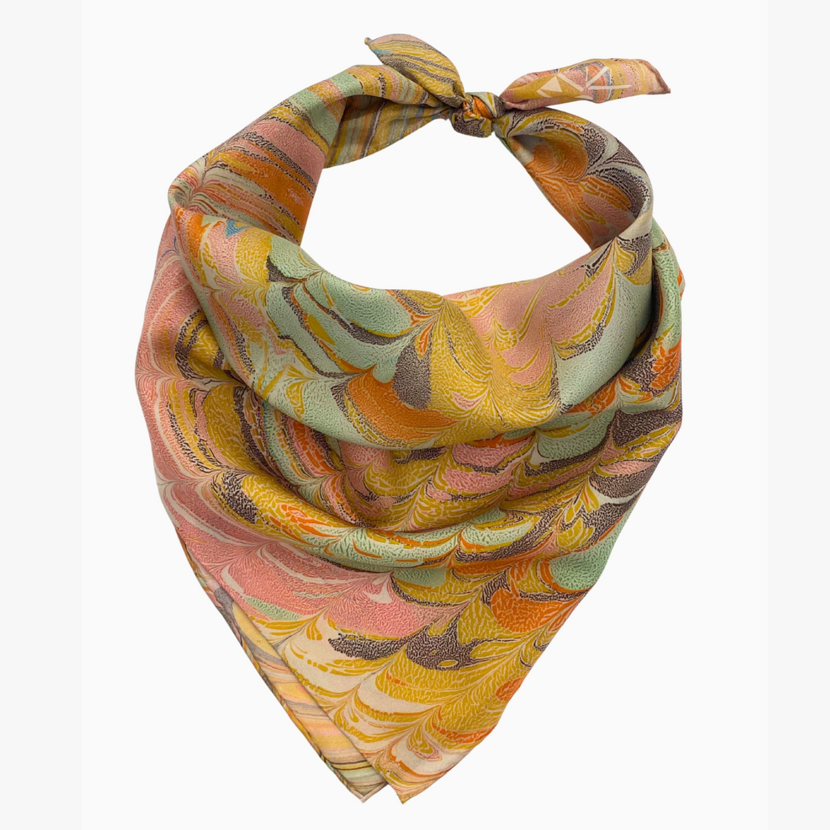 A lightweight silk bandana scarf with a marbled pattern in muted orange, yellow, sage green, and dusty pink, tied in a knot at the top and displayed against a clean white background.